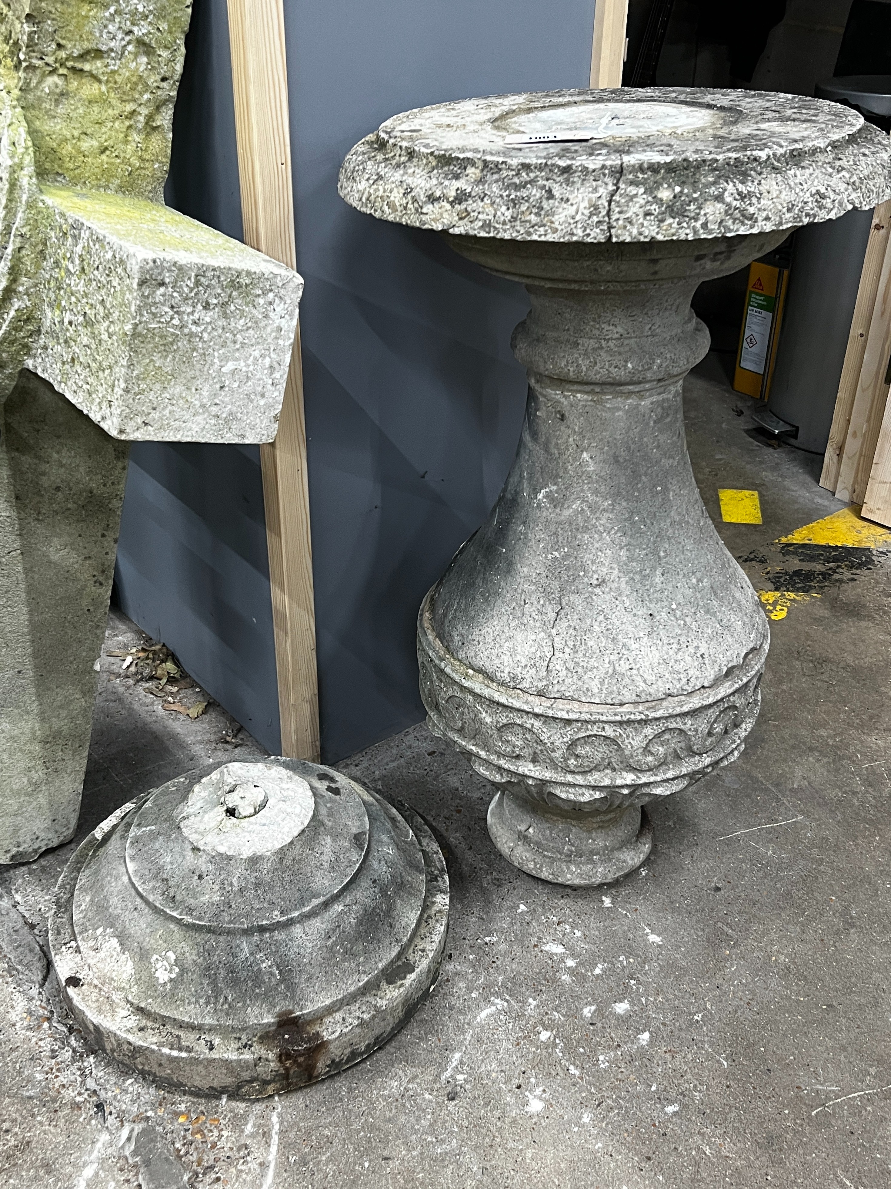 A reconstituted stone baluster sundial base, diameter 49cm, height 107cm (a.f.)